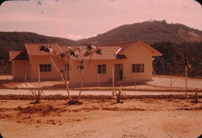 A house with a fence around it

Description automatically generated with low confidence