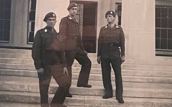 A group of men posing for a photo

Description automatically generated with medium confidence