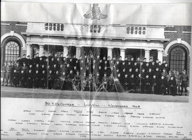 A group of people standing in front of a building

Description automatically generated with low confidence