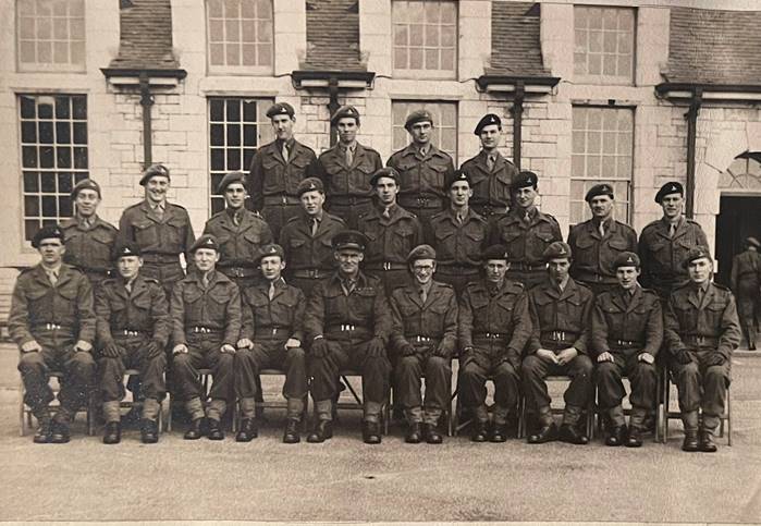 A group of men in uniform

Description automatically generated with low confidence