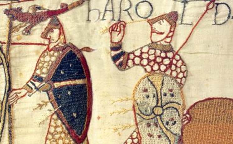 A close-up of a medieval tapestry

Description automatically generated