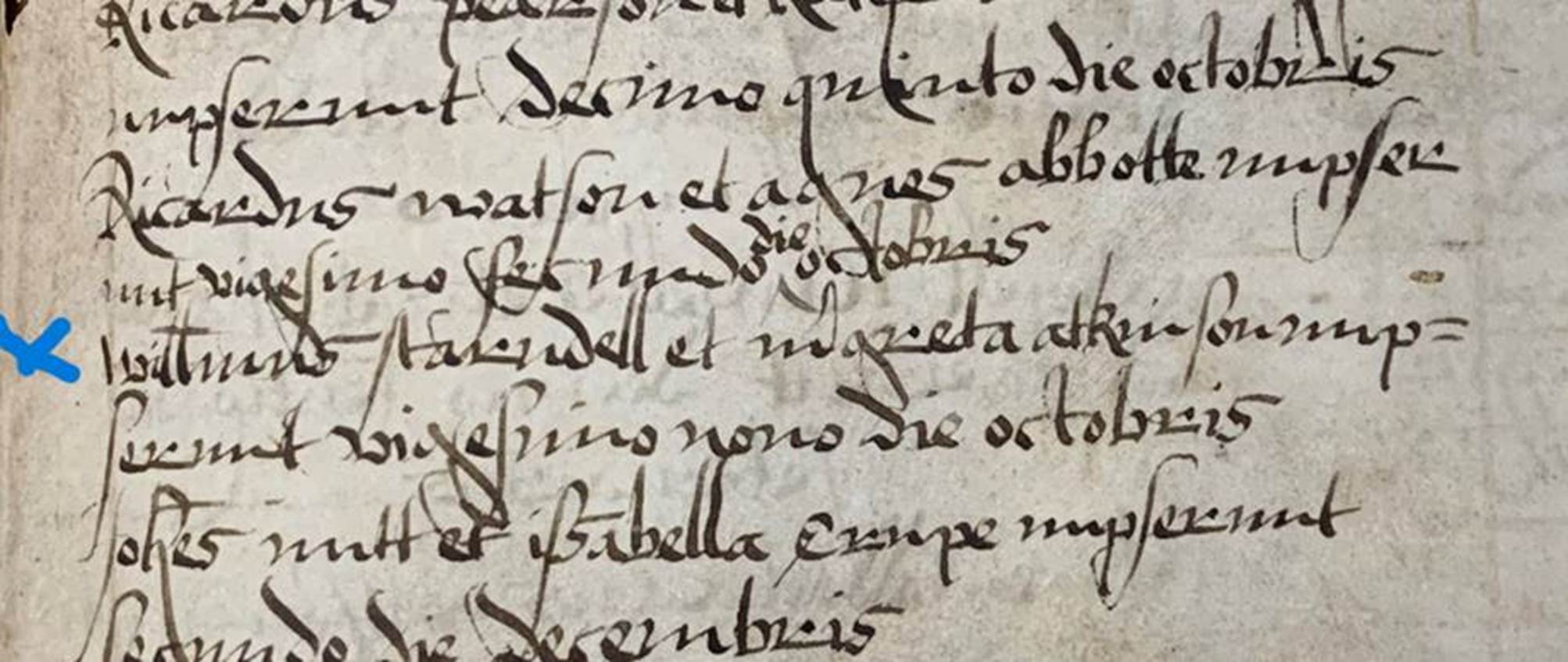 A close up of a manuscript

Description automatically generated