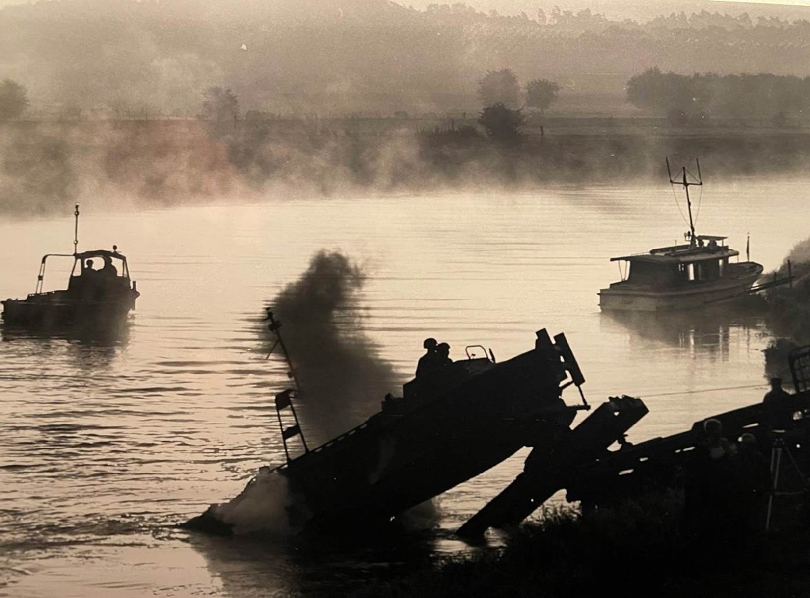 A group of boats in a body of water

Description automatically generated with low confidence