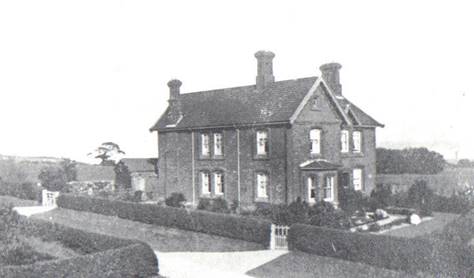 A black and white photo of a house and some trees

Description automatically generated with low confidence