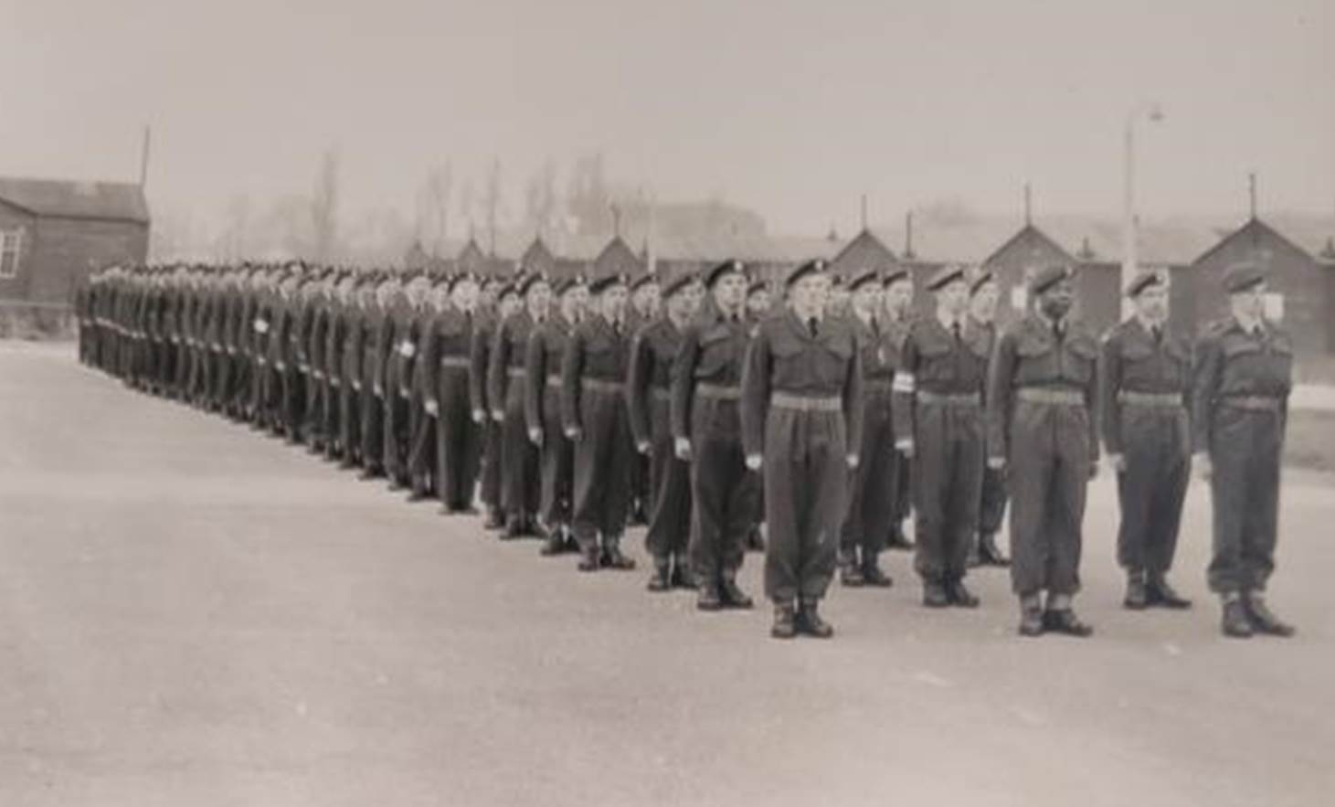 A group of men in uniform

Description automatically generated