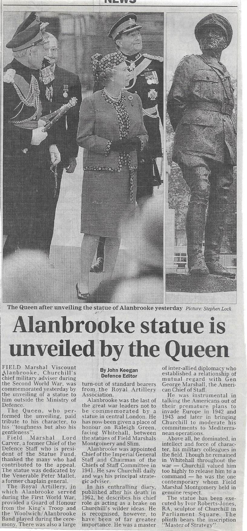 A newspaper article with a picture of a statue

Description automatically generated