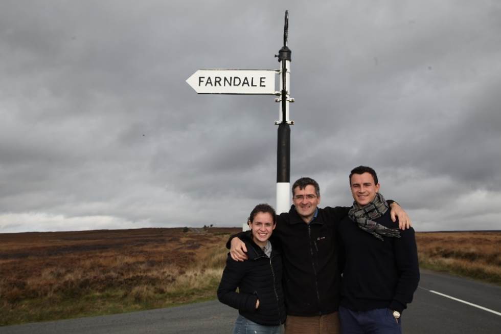 A group of people posing for a photo

Description automatically generated