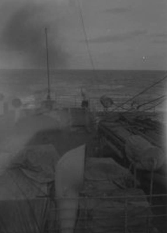 A black and white photo of a ship

Description automatically generated