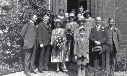         A group of people standing outside a building